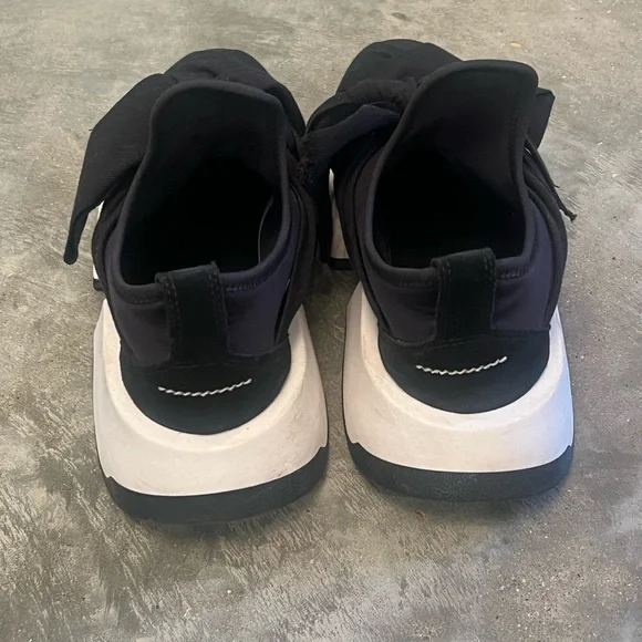Authentic Maison Margirla platform bow tie sneaker